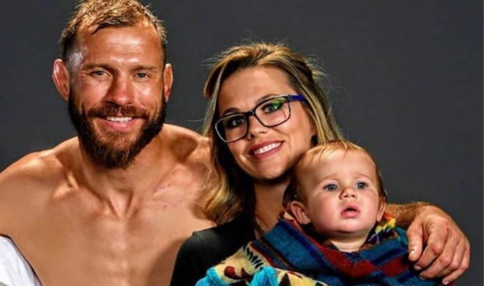 Image of Donald Cerrone with his partner, Lindsay Sheffield, and their son, Riot River