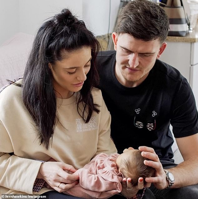 Image of Harry Maguire with his wife, Fern Hawkins , and their daughter, Piper Rose