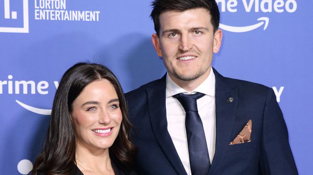 Image of Harry Maguire with his wife, Fern Hawkins 