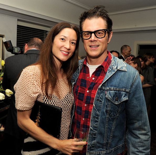 Image of Johnny Knoxville with his wife, Naomi Nelson