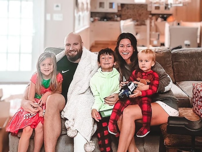 Image of Lane Johnson and Chelsea Goodman with their kids