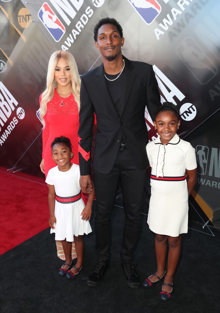 Image of Lou Williams with his partner, Rece Mitchell, and their kids