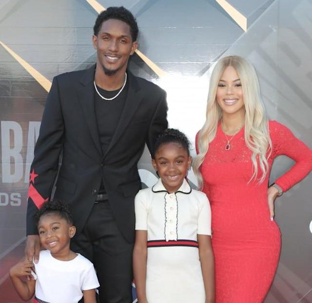 Image of Lou Williams with his partner, Rece Mitchell, and their kids