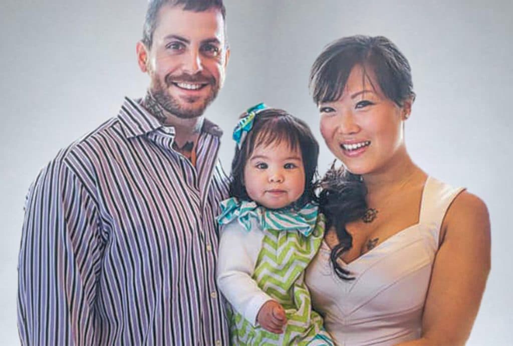 Image of Michael Fanone with his ex-wife, Hsin-Yi Wang, and their daughter