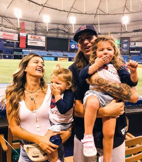 Image of Mike Clevinger with his wife, Monica Ceraolo, and their kids, Penelope Grace and Piper Lotus