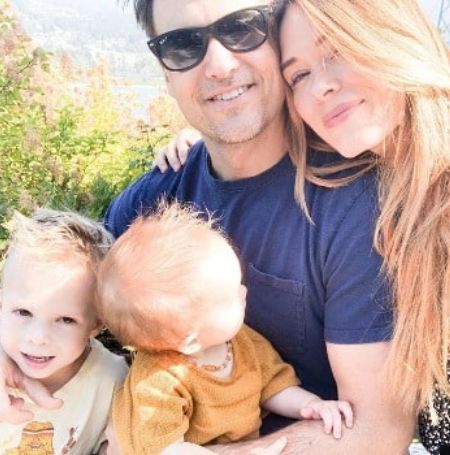Image of Nick Zano with his wife, Leah Renee Cudmore, and their kids
