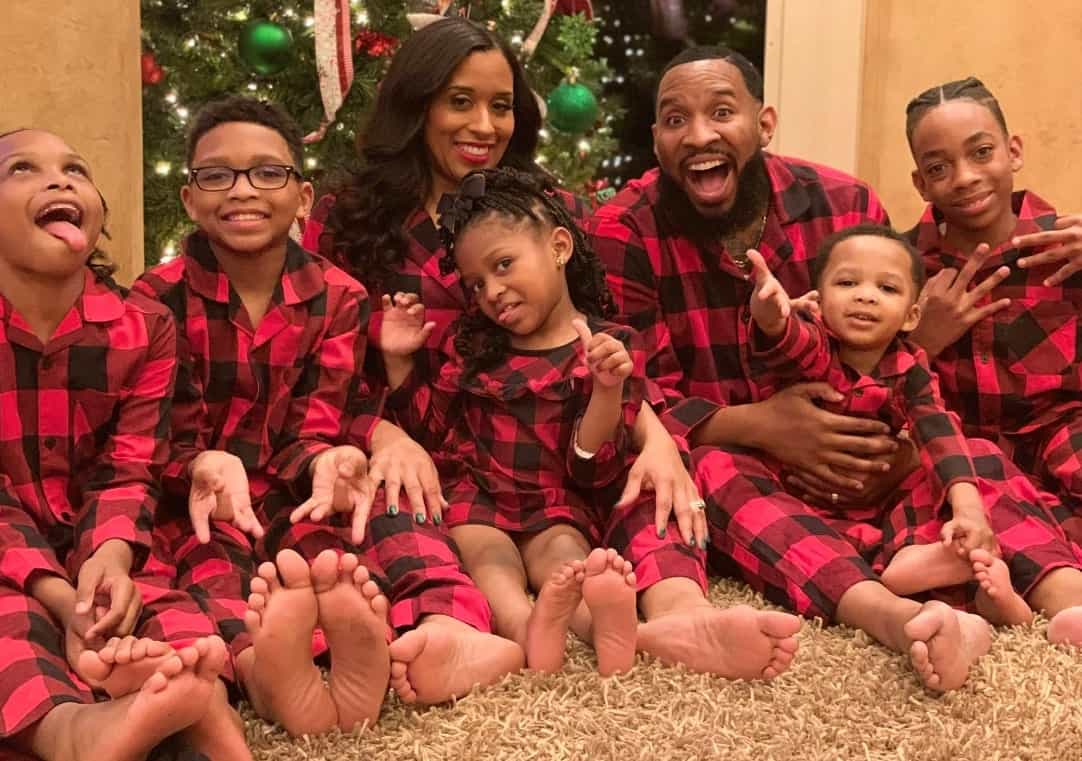 Image of Pastor Mike Jr. with his wife, Lady J, and their kids