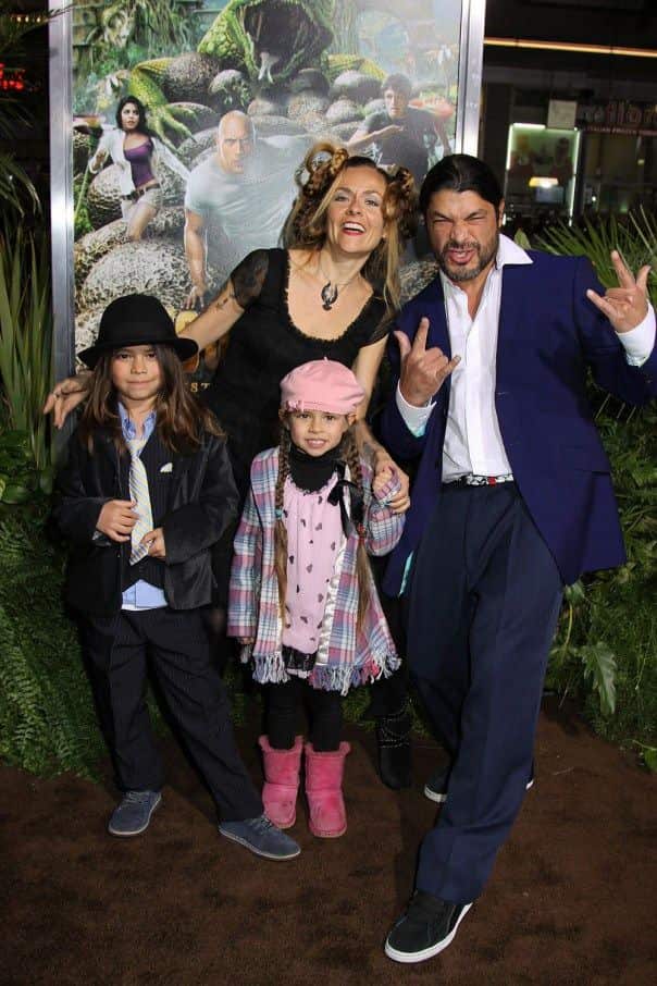 Image of Rob Trujillo with his wife, Chloe Barthelemy, and their kids, Tyler and Lula