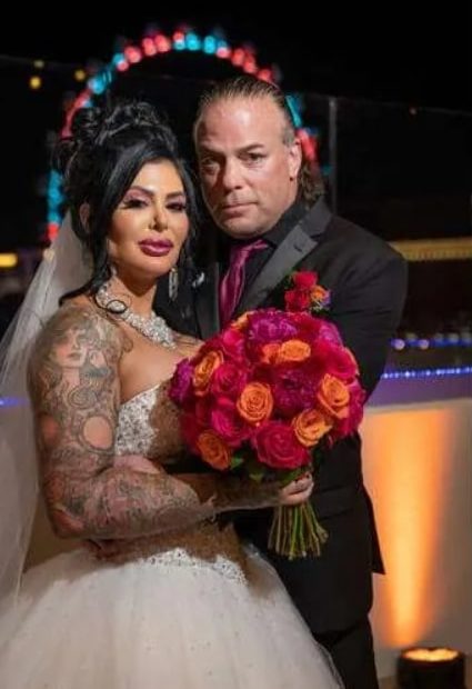 Image of Rob Van Dam with his wife, Katie Forbes