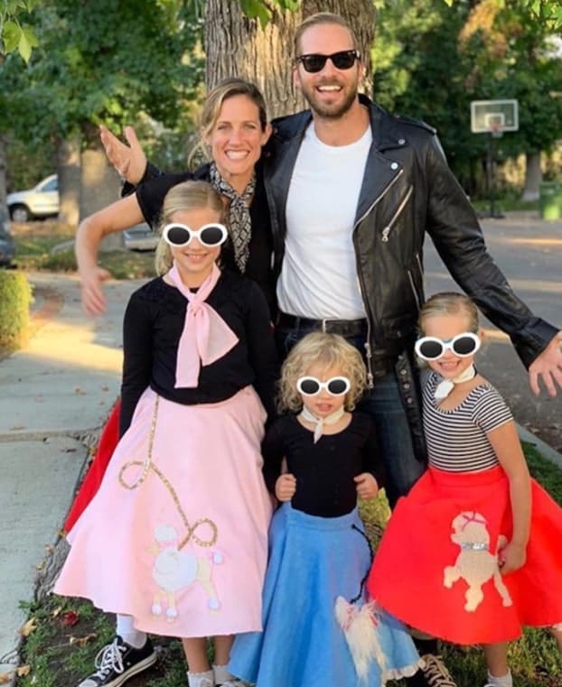 Image of Ryan Hansen with his wife, Amy Russell, and their kids
