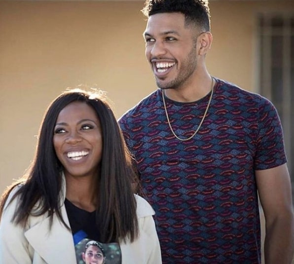 Image of Sarunas Jackson with his partner, Dominique Perry