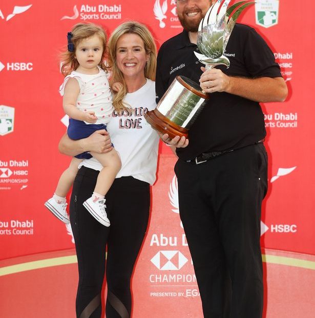 Image of Shane Lowry with his wife, Wendy Honner, and their daughter, Iris