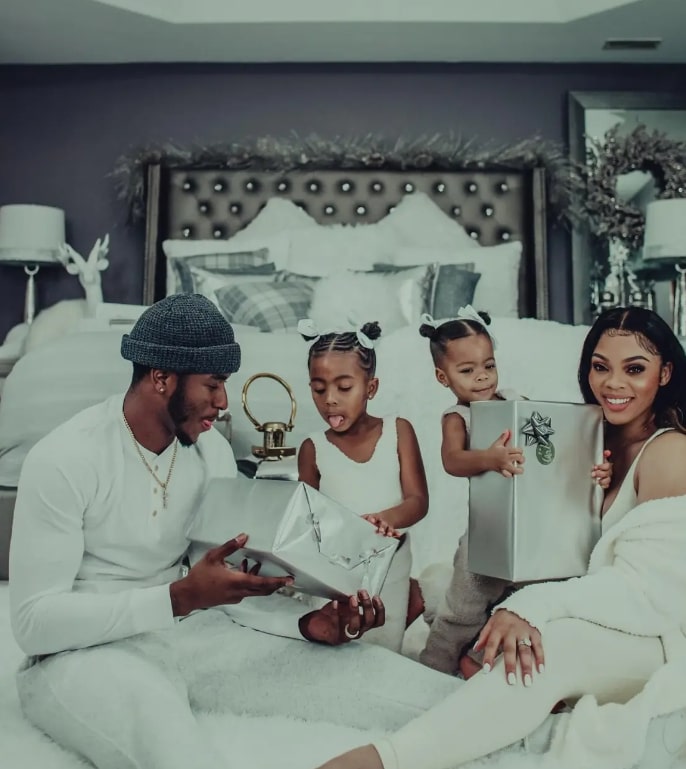 Image of Tim Anderson with his wife, Bria Anderson, and their daughters, Peyton and Paxton