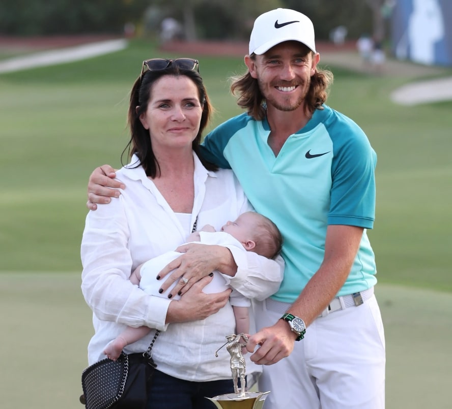 Image of Tommy Fleetwood with his wife, Clare Fleetwood, and their son, Franklin Fleetwood