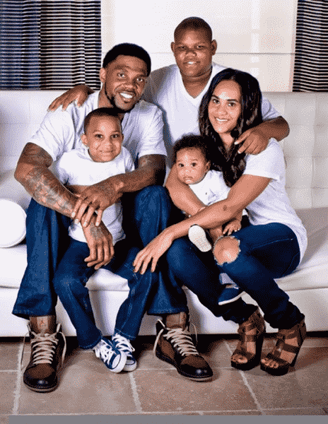 Image of Udonis Haslem with his wife, Faith Rein-Haslem, and their kids