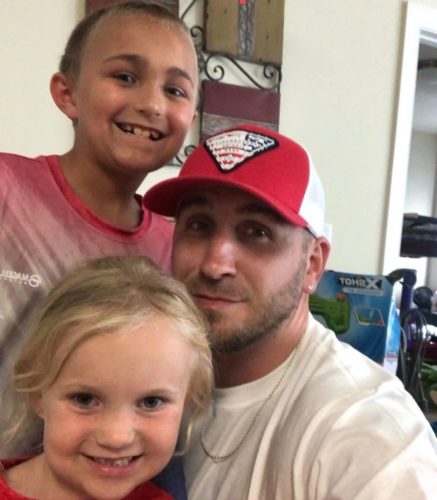 Image of Kevin Eudy with his kids