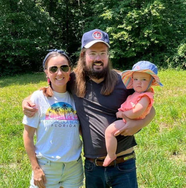 Image of Dusty Slay with is wife, Hannah Hogan Slay, and their daughter