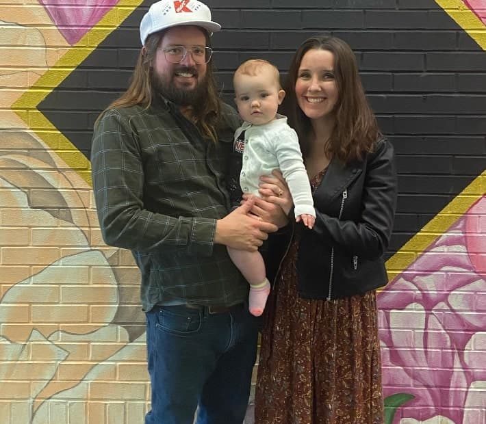 Image of Dusty Slay with is wife, Hannah Hogan Slay, and their daughter
