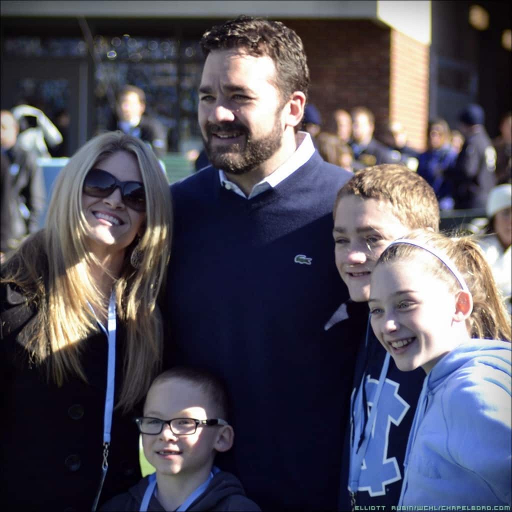 Image of Jeff Saturday with his wife, Karen Saturday, and their kids