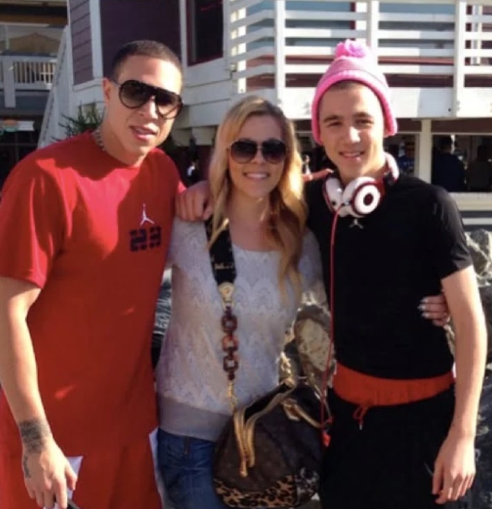 Image of Mike Bibby with his wife, Darcy Watkins, and their son, Michael Dane