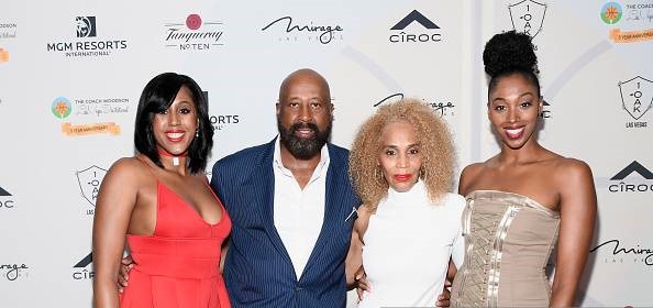 Image of Mike Woodson with his wife, Terri LaQuita Howard, and their daughter, Alexis One and Mariah Kayla
