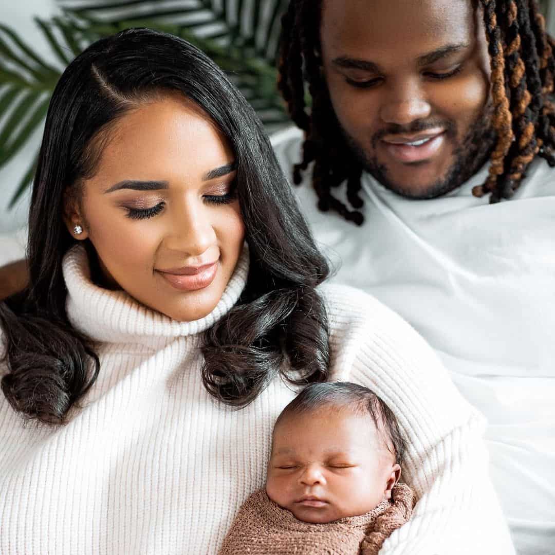 Image of Tee Grizzley with his partner, Myeisha Agnew, and their son, Terry Wallace II