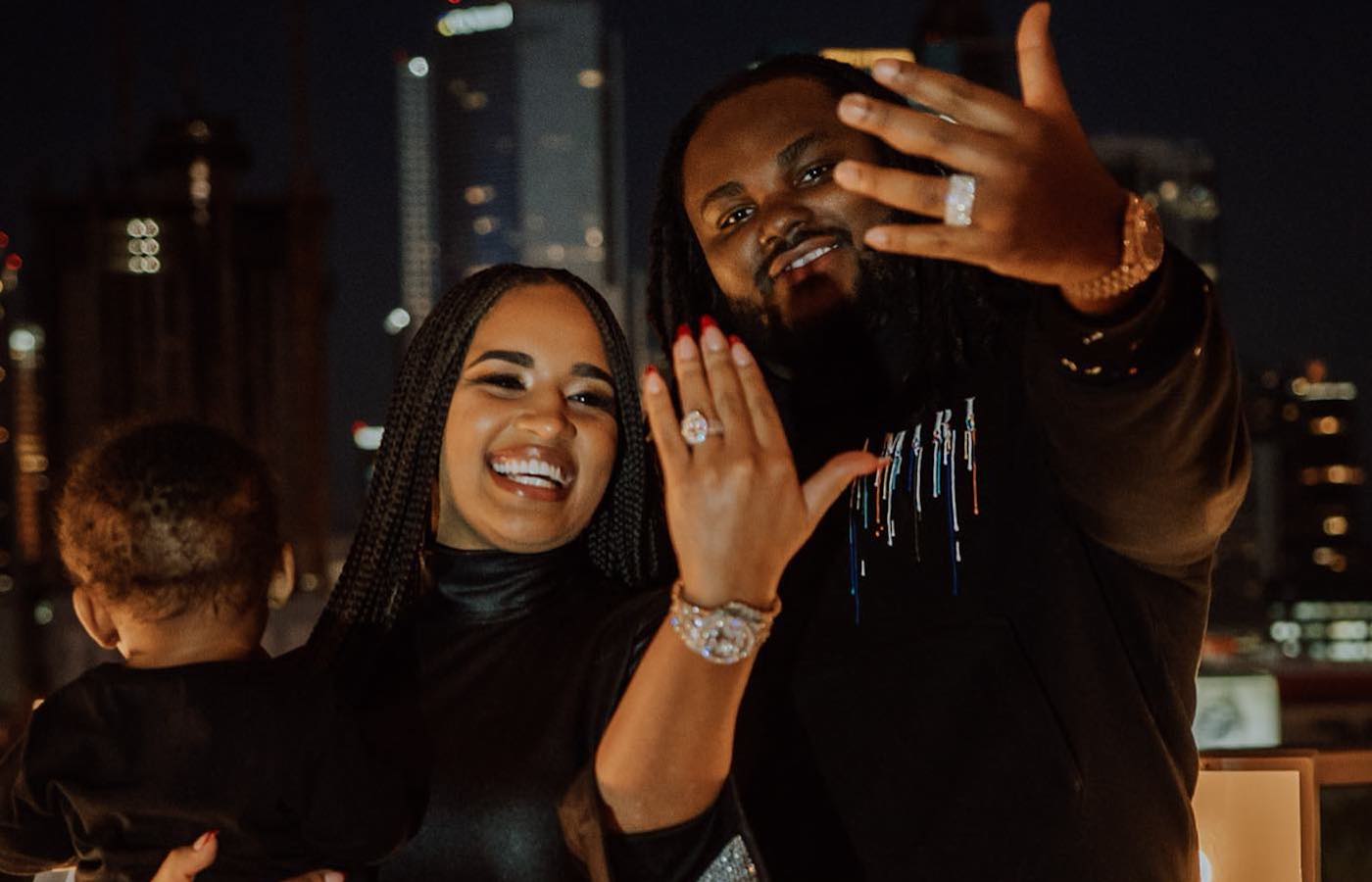 Image of Tee Grizzley with his fiancée, Myeisha Agnew