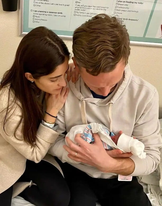 Image of Tommy Vietor with his wife, Hanna Koch, and their daughter, Margot
